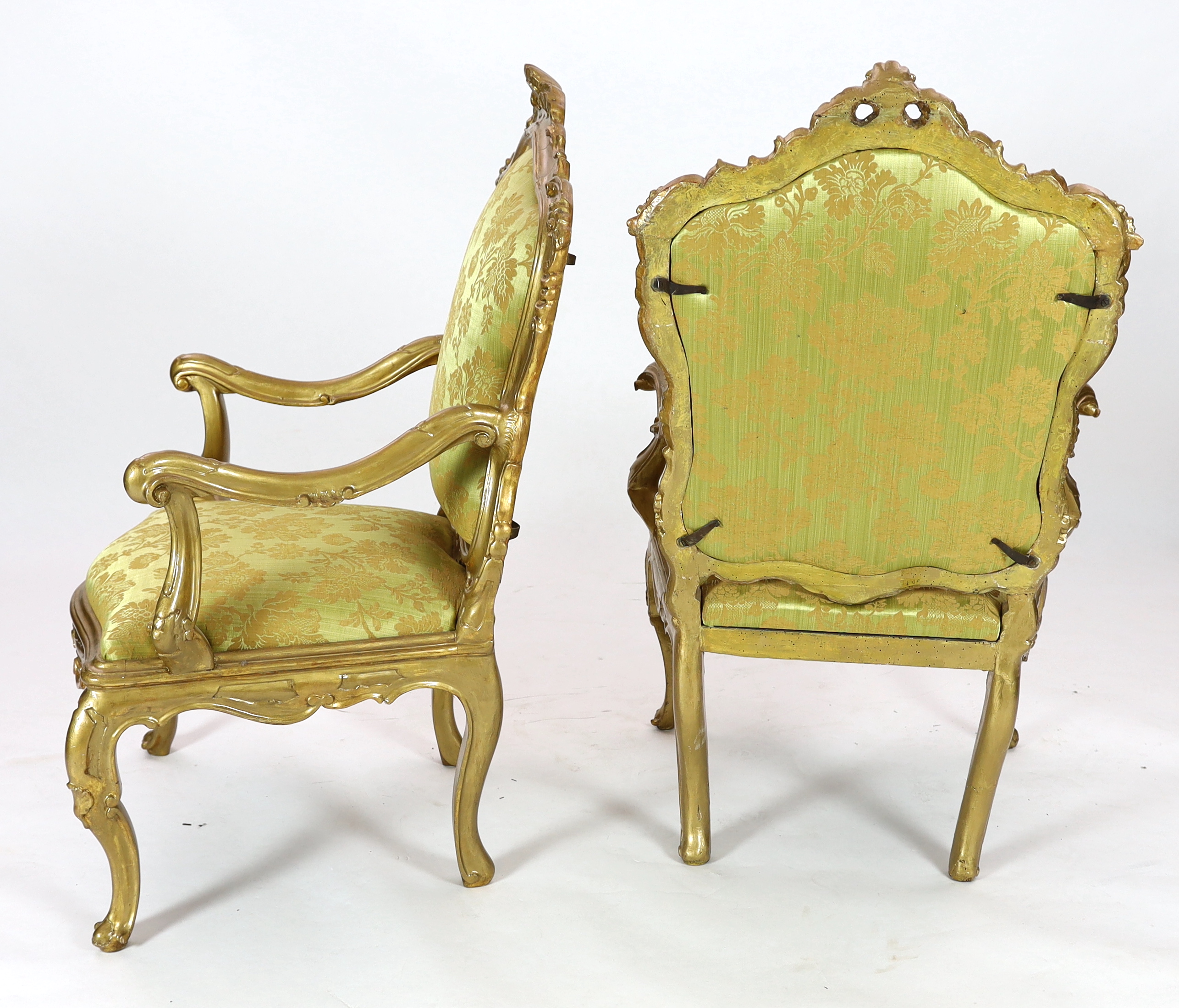 A set of six 18th century Venetian carved giltwood open armchairs, 80cm wide, 68cm deep, 122cm high, Please note this lot attracts an additional import tax of 5% on the hammer price